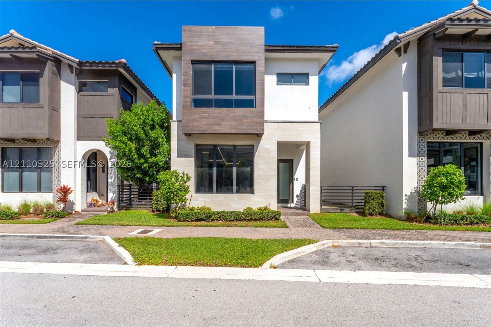 Exterior of the two-story single-family home at 8061 NW 42nd St, Doral, FL 33166, listed at $1,295,000